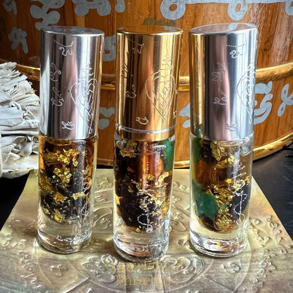 Bottle of Saneh attraction love oil by Aj Ruang