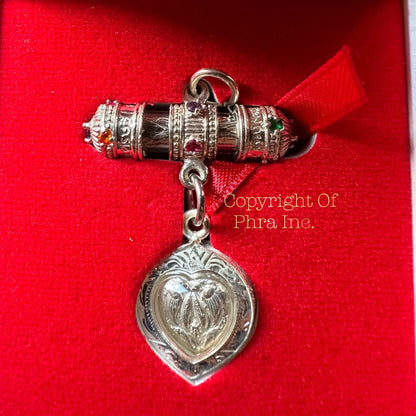Close up of the Takrut 108 silver casing by Kruba Noi