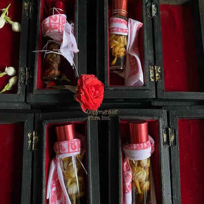 Minyak Pemaisuri Malam oil bottle with wafaq cloth, close up