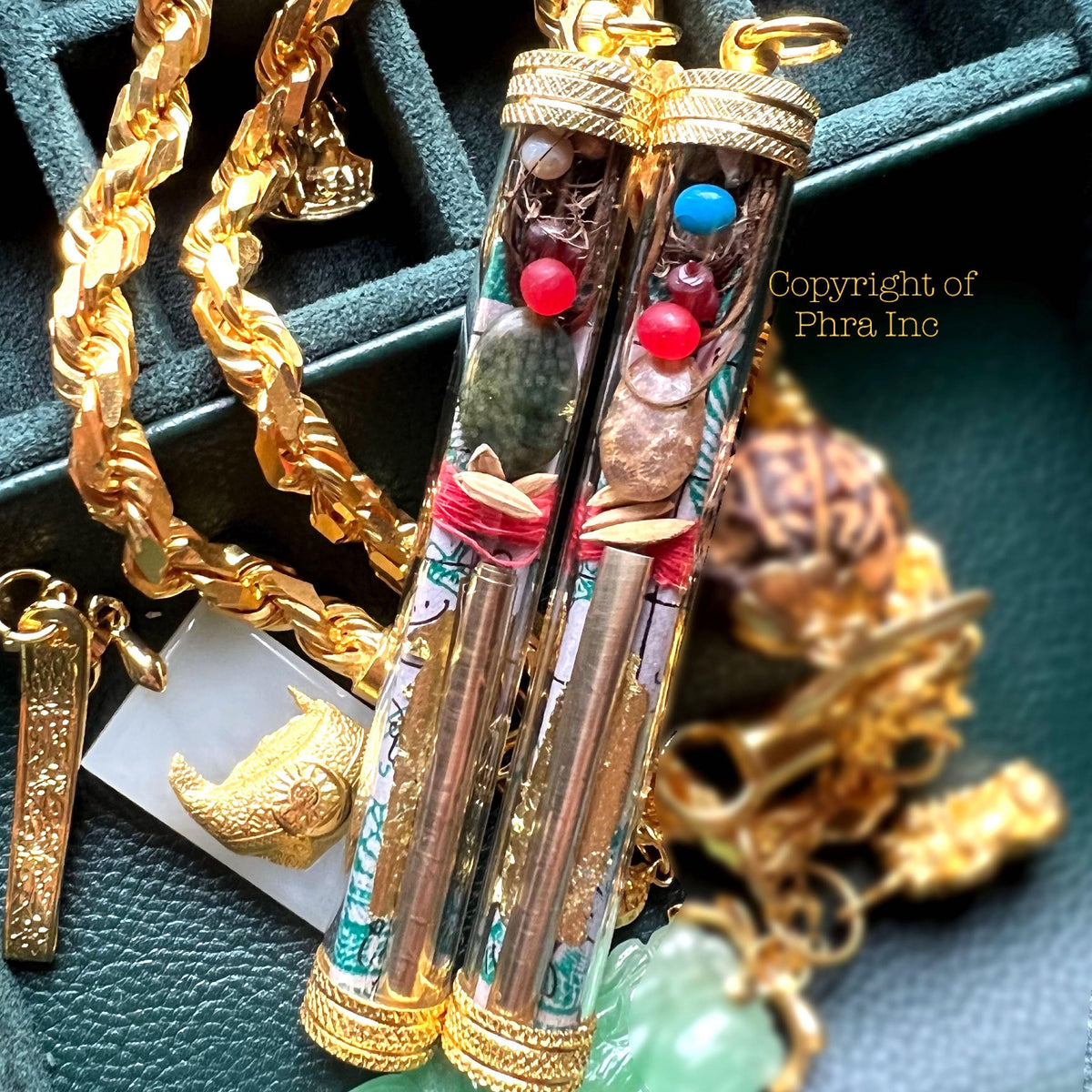 Hardcore Wealth 6-in-1 takrut amulet with Ibu Duit note and 5 mustika pearls, front view