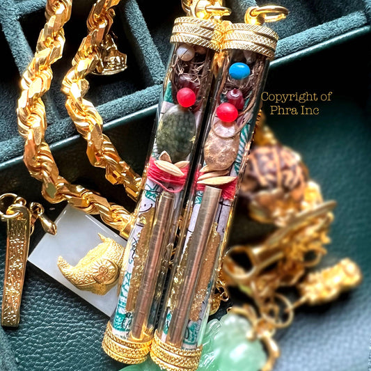 Hardcore Wealth 6-in-1 takrut amulet with Ibu Duit note and 5 mustika pearls, front view