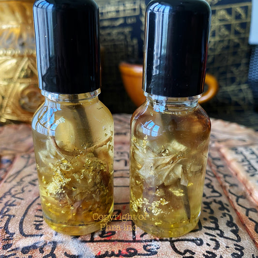 Thai love attraction oil bottle with Wahn Sao Long herb, front view