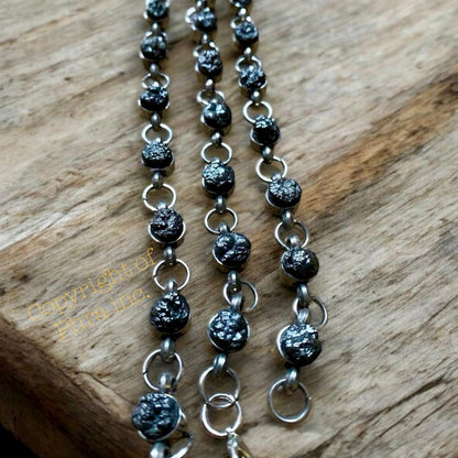 Close up of the Leklai Tarad crystal beads