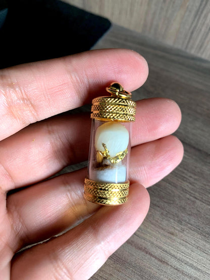 Coconut Pearl ring on finger, alternate angle