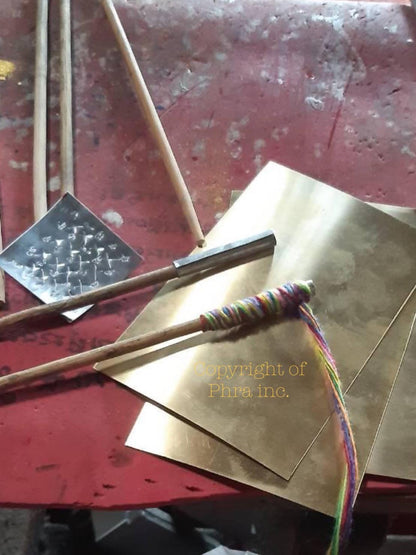 Palakid protection amulet shown against plain background