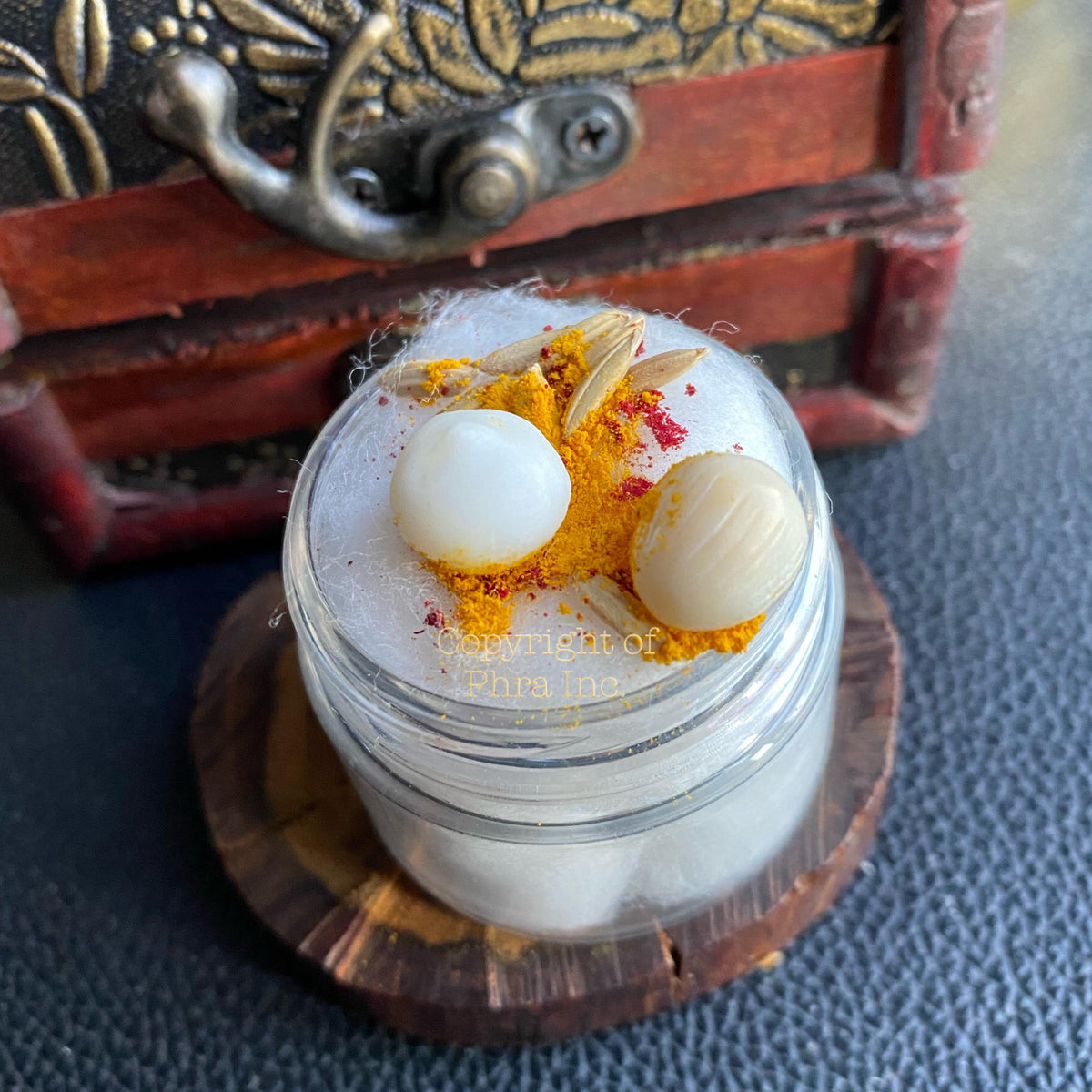 Coconut Pearl ring displayed on a stand