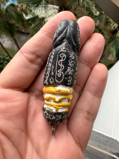 Palakid wealth and protection talisman, angled view