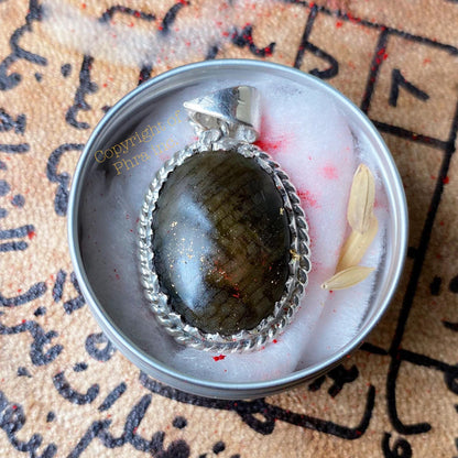 Close-up of the Nagamani Cobra Pearl in the silver setting
