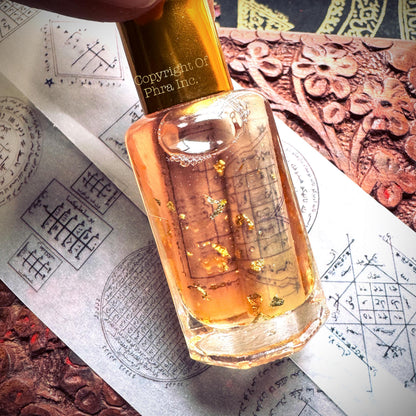 Bottle of 107 Divine Blessing wealth empowerment oil