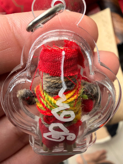 Hoon Payon protective amulet with packaging