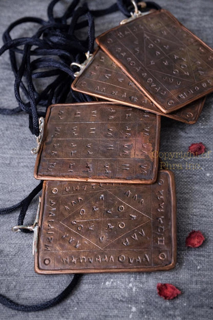 King Taweez talisman displayed at an angle
