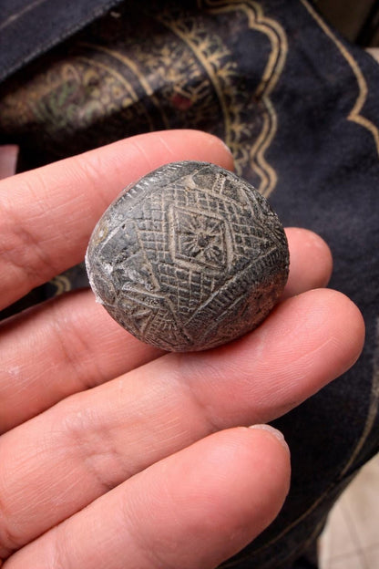 Rahu astrological talisman shown at an angle