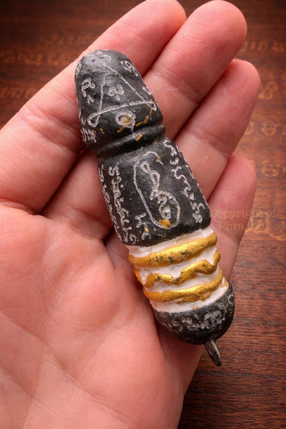 Maha Larp Palakid amulet shown with cord for wearing