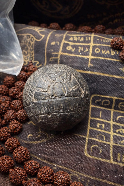 One eye coconut Rahu talisman shown from the side