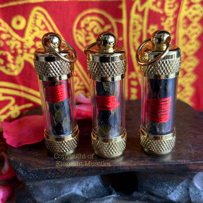 Dewa Yakong amulet displayed with its packaging