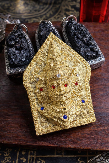 Close-up of Asura King amulet charm detail