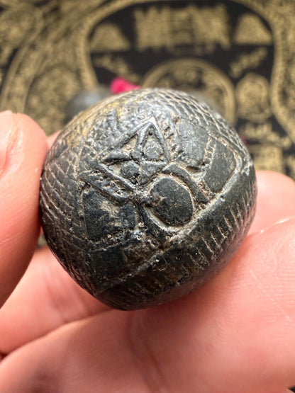 Close up detail of the Rahu talisman surface