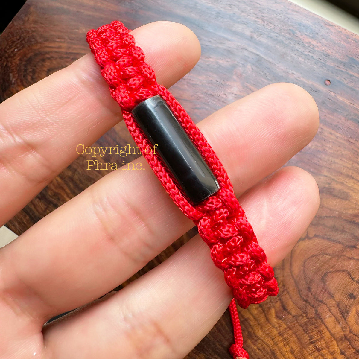 Takrut Kasatorn protection bracelet by Kruba Noi, front view