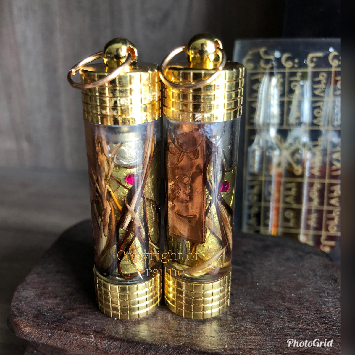 All-round blessing takrut held in hand for size