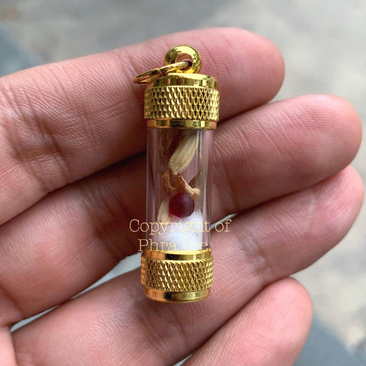 Red king centipede pearl mustika pendant, front view