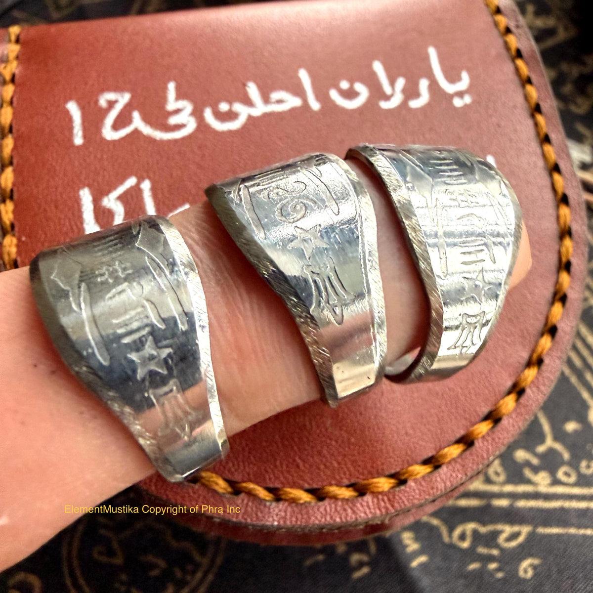 Solomonic talisman ring shown with its ritual oil