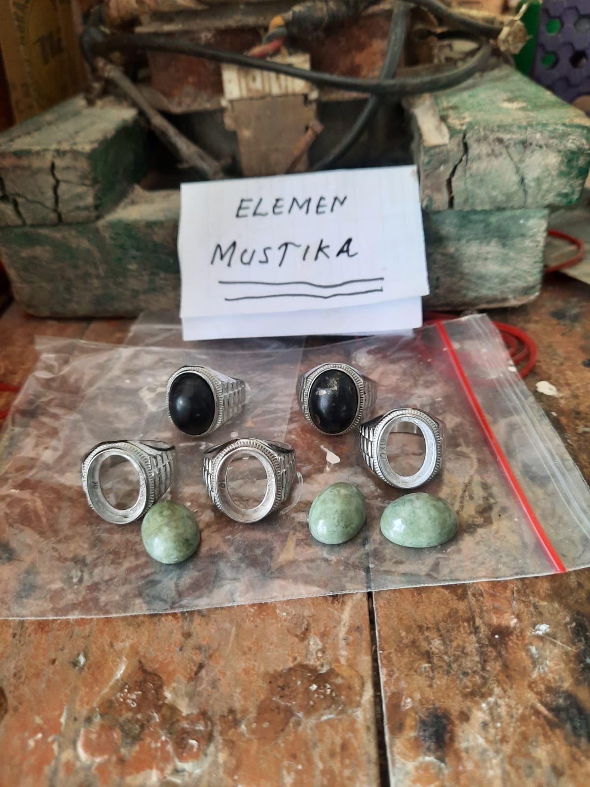 Green Sojol stone shown in hand for size