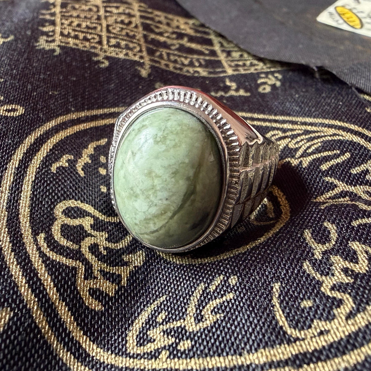 Green Sojol Hercules Stone in stainless steel setting, front view