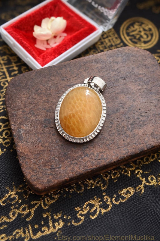 Golden Cobra Pearl Nagamani stainless steel pendant, front view