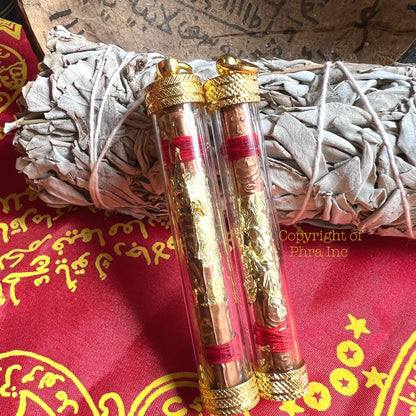 Handwritten Vashikaran yantra on copper foil