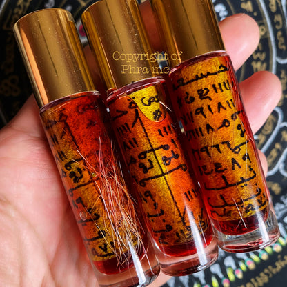 Tambang Liring wealth and love attraction talisman oil bottle, front view