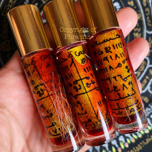 Tambang Liring wealth and love attraction talisman oil bottle, front view