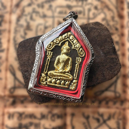 Close up detail of the Khun Paen amulet carving