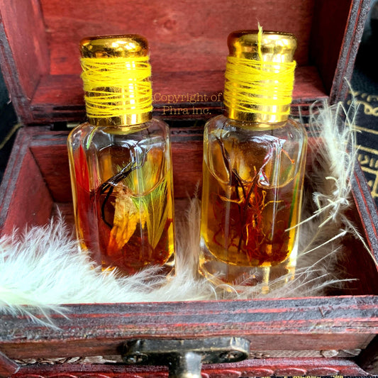 Chendrawasih attraction charm oil bottle, front view