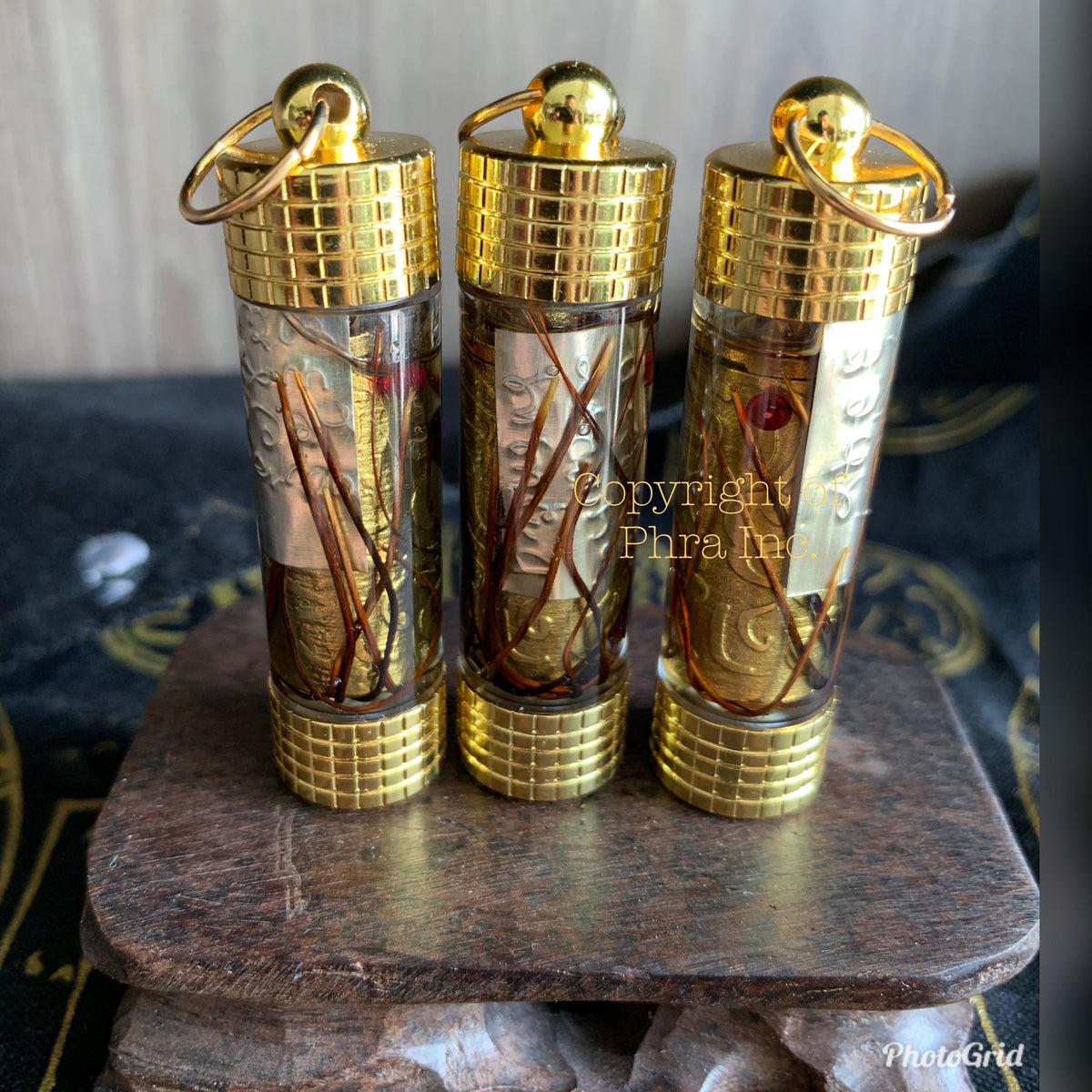 108 Empowered wealth takrut talisman with 7 holy items, front view