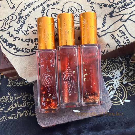 Ajarn Ruang Maha Saneh love attraction oil bottle, front view