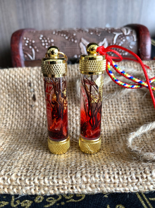 Love and luck attraction charm oil pendant, front view