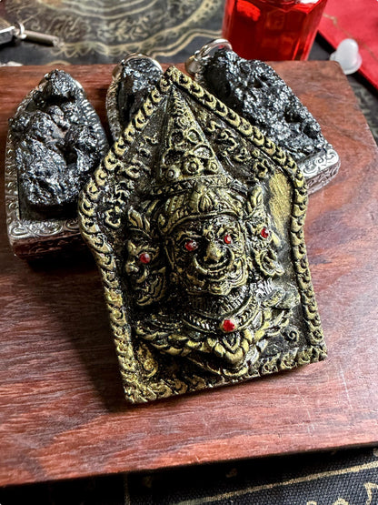 Legendary Asura King amulet, encased and ready to wear, front view